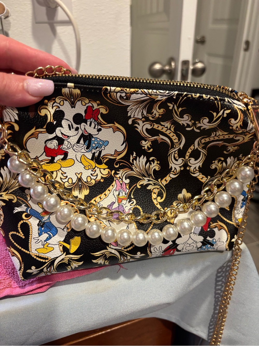Aldo Black and Gold Disney Pearl Chain Wristlet